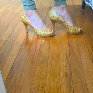 Cream and gold peep toe pumps
